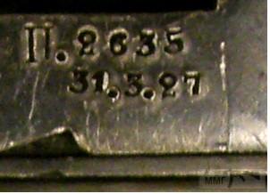 67115