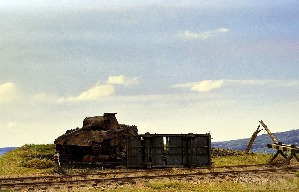 76956