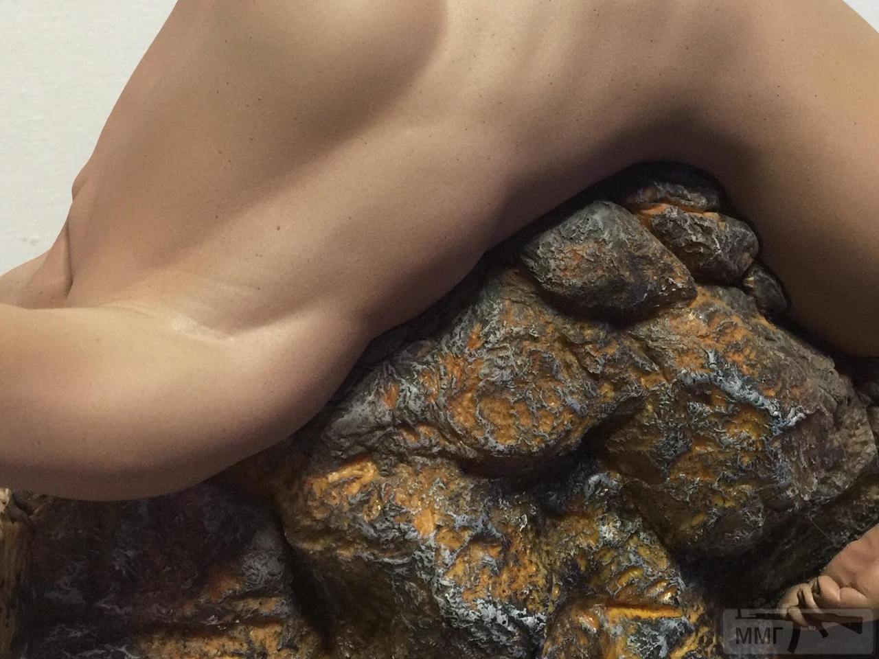 77058